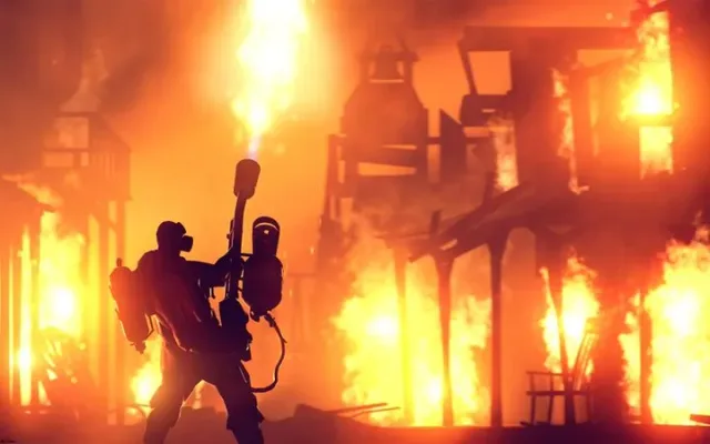 Team Fortress 2 gameplay on a payload map with on-screen HUD
